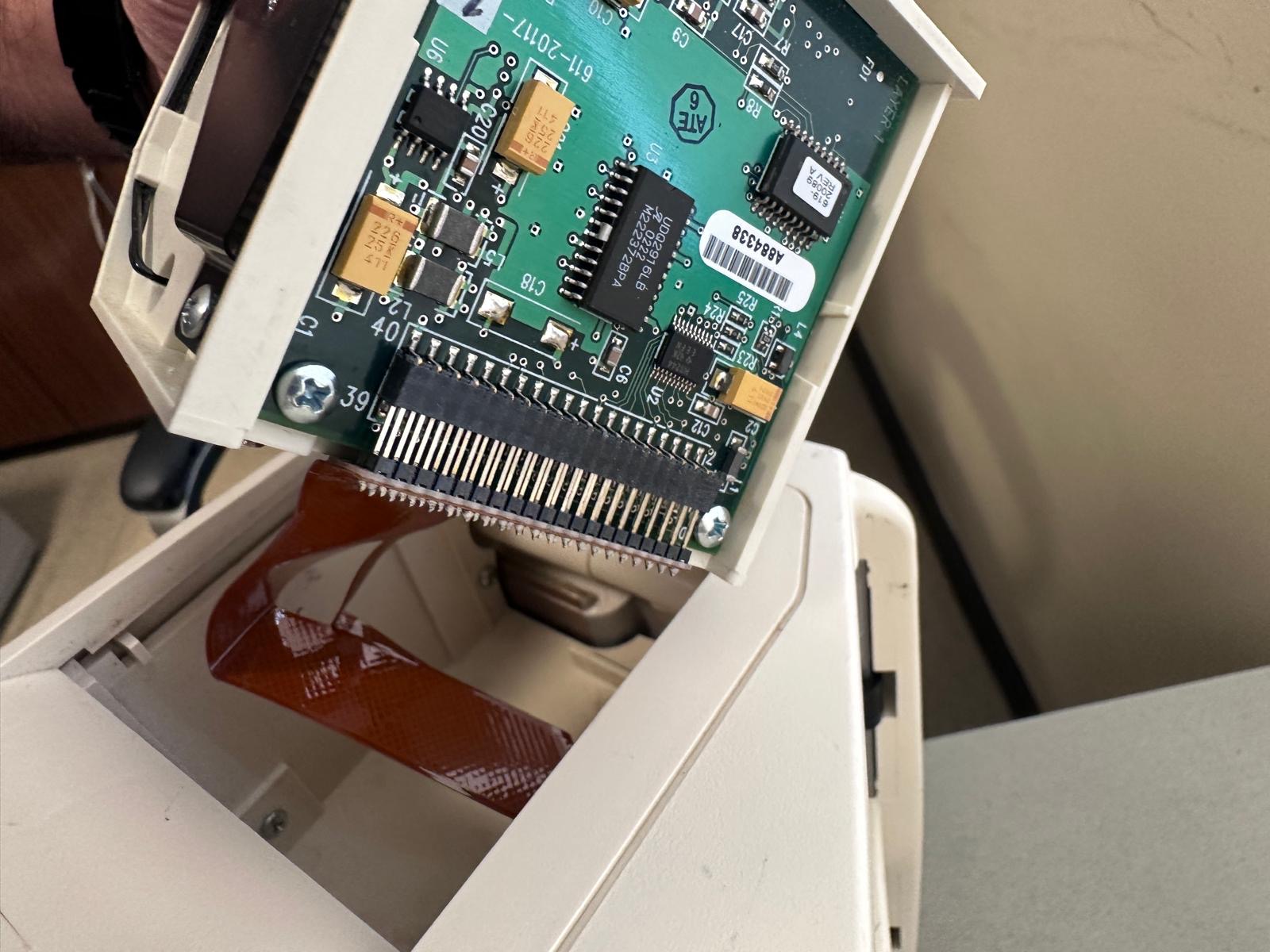 LIFEPAK 20 printer assembly and ribbon cable during printer replacement