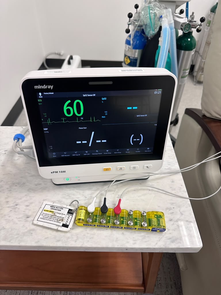 Mindray ePM 10M patient monitor connected to an ECG simulator during testing.