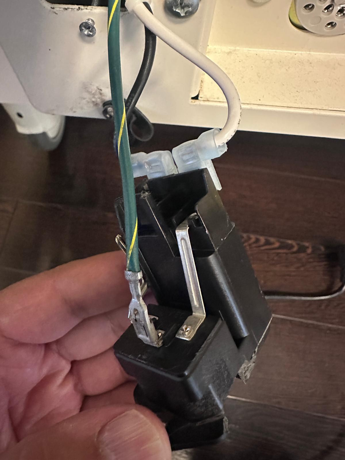 Power entry module and terminal wiring during patient-bed service.