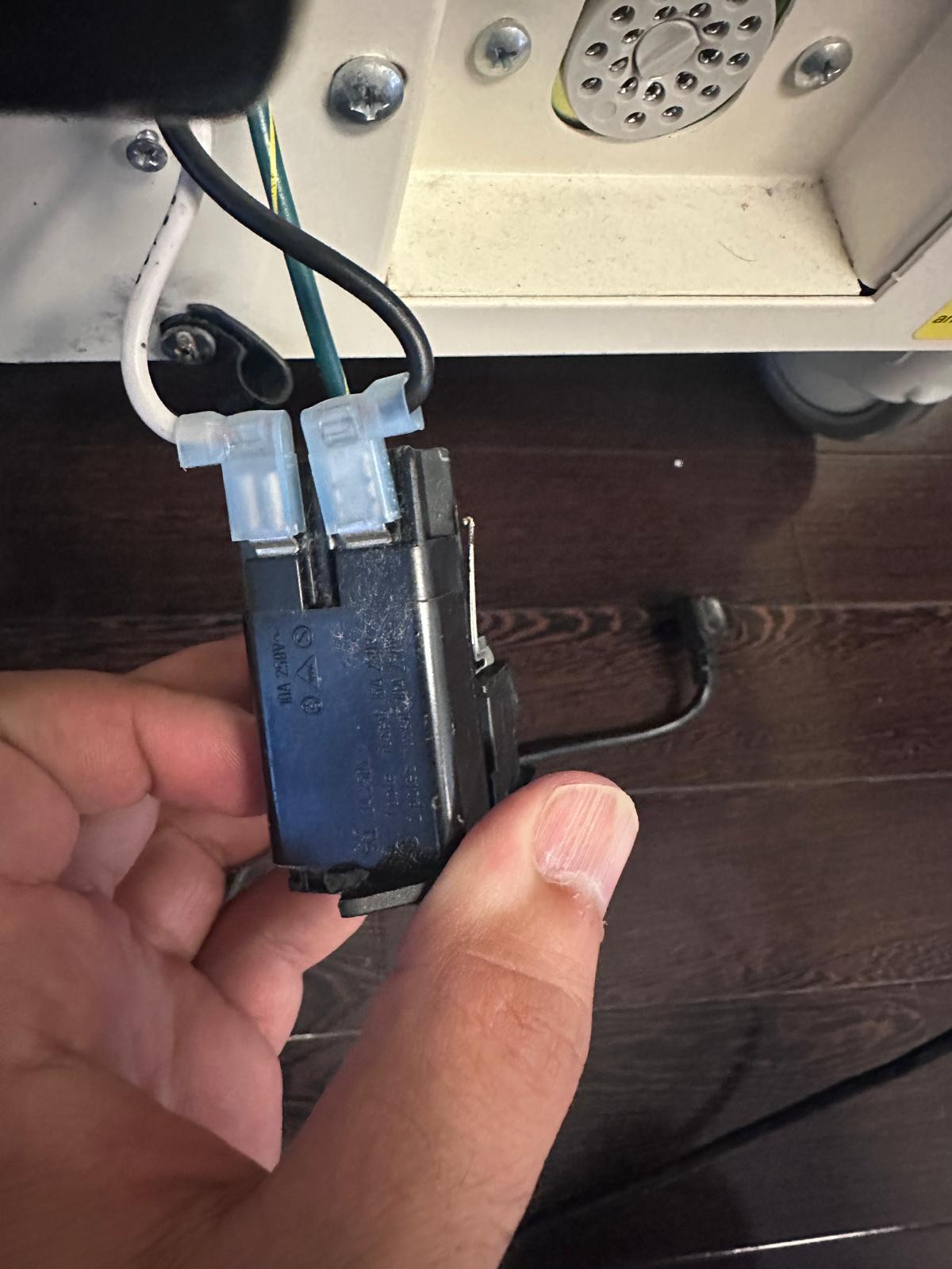 Power entry module and terminal wiring during patient-bed service.